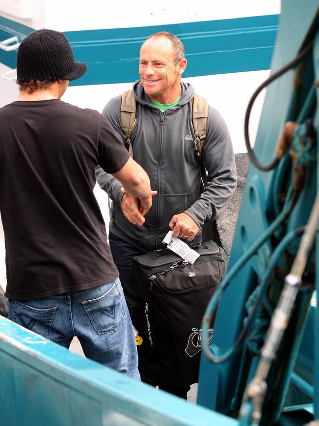 Pro surfer Tom Carroll meeting Tasmanian big wave surfer Marti Paradisis ahead of a trip to surf Pedra Branca, an island off Tasmania's South East Cape in 2008. Their adventures were filmed by a 60 Minutes TV crew. Picture: Kim Eiszele