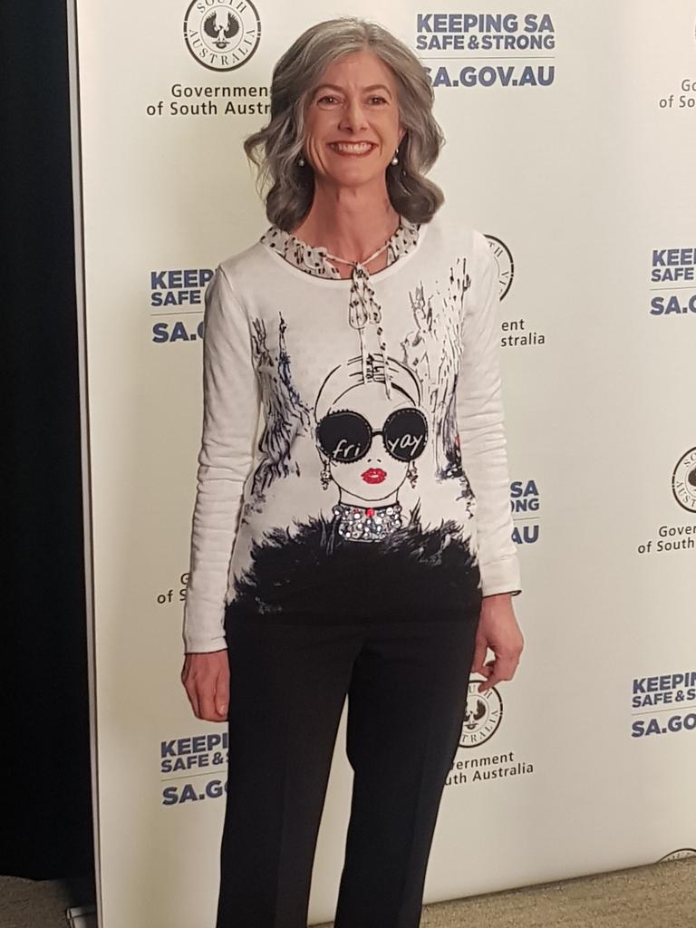 SA Chief Medical Officer Professor Nicola Spurrier wearing a 'Friyay' top while announcing zero active covid-19 cases in South Australia. Photo: Andrew Hough