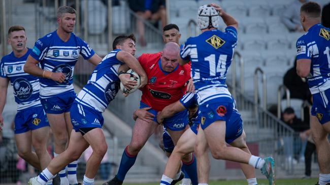 Devils Vs Butchers. Grant Millington with the charge. Picture Thomas Lisson