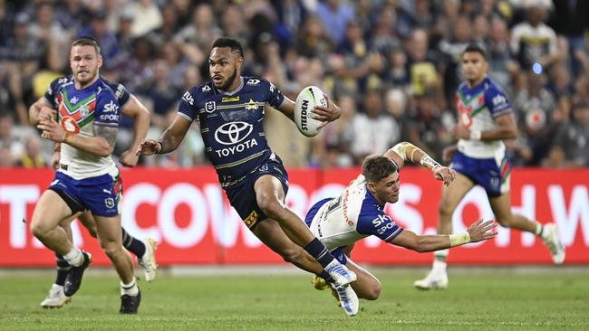 Hamiso Tabuai-Fidow in action for the Cowboys gets past ex-Warrior Reece Walsh on August 19, 2022, in Townsville, Australia. (Photo by Ian Hitchcock/Getty Images)