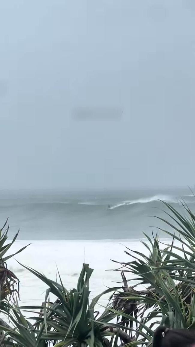 Only in Australia: Queenslanders 'prepare' for Cyclone Alfred by surfing massive waves