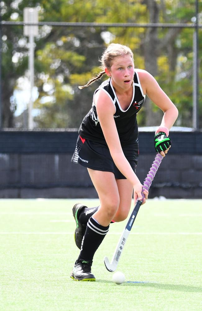 Skye Vaughan, 13, playing hockey for the Norths Hockey Club Mackay. Picture: Contributed