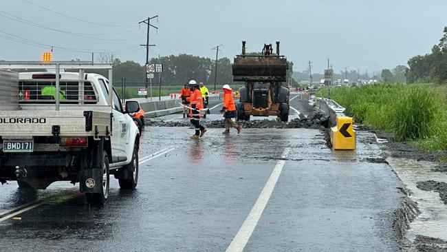 Floods closed off the Bruce Highway at Calen, where roadworks were under way. Picture: Heidi Petith.