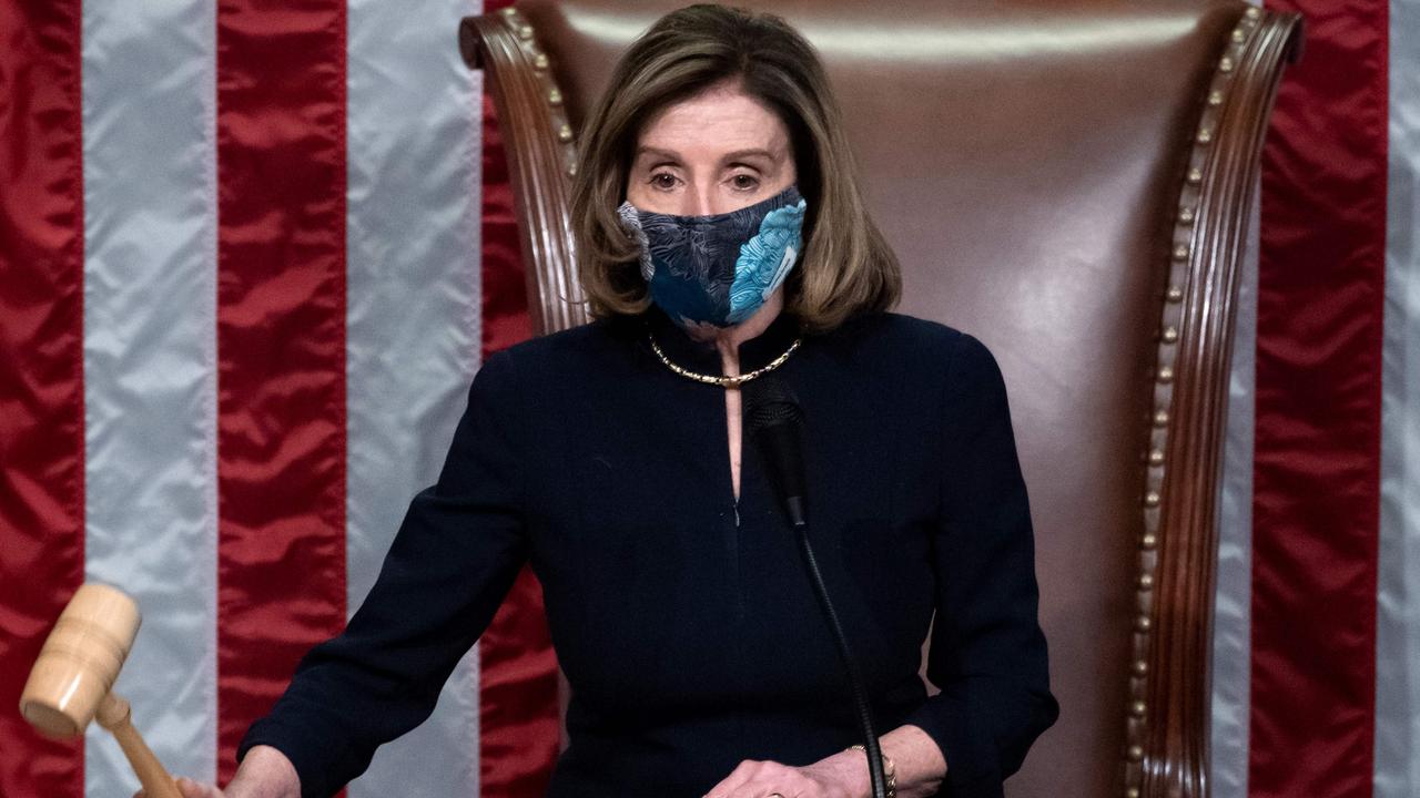 Speaker of the House Nancy Pelosi puts down the gravel as she presides over the US House of Representatives vote on the impeachment of Donald Trump on, January 13. Picture: Saul Loeb/AFP