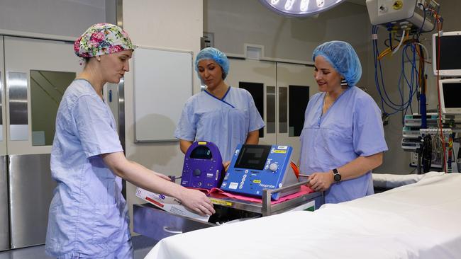 In 2023, Cairns Hospital surgical department has acquired a new Neoprobe gamma probe for breast cancer and melanoma surgery, funded by the BDO Arrow Experience fundraiser through the Far North Queensland Hospital Foundation. Surgeon Aemelia Melloy demonstrated the equipment to CEO Gina Hogan and BDO Accountants CEO Stacey Young. Picture: Brendan Radke