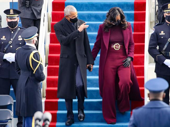 Barack Obama and Michelle Obama arrive at the inauguration. Picture: Getty Images.