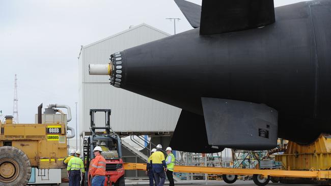 ASC rolls out HMAS Farncomb from the maintenance shed in 2015. Picture: Tricia Watkinson