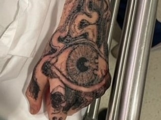Police have released this image of a hand tattoo as they seek the public's help to identify a man involved in a crash on the Sydney Harbour Bridge. Picture: NSW Police