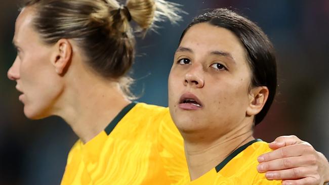 SYDNEY, AUSTRALIA - AUGUST 16: Sam Kerr of Australia is consoled by Emily Van-Egmond after the team's 1-3 defeat and elimination from the tournament following the FIFA Women's World Cup Australia & New Zealand 2023 Semi Final match between Australia and England at Stadium Australia on August 16, 2023 in Sydney / Gadigal, Australia. (Photo by Brendon Thorne/Getty Images)