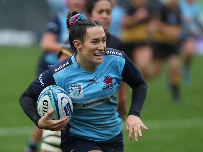 SYDNEY, AUSTRALIA - MARCH 14: Maya Stewart of the Waratahs scores a try during the round five SuperW Rugby match between New South Wales and Rugby Western Australia at Sydney University on March 14, 2020 in Sydney, Australia. (Photo by Tony Feder/Getty Images)