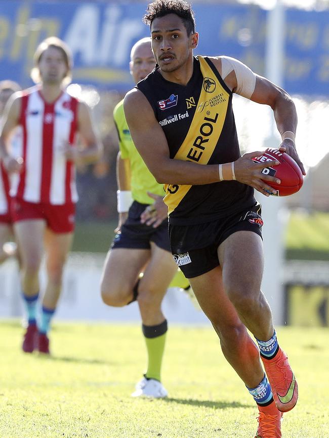 Marlon Motlop in action against former club North Adelaide. Picture SARAH REED