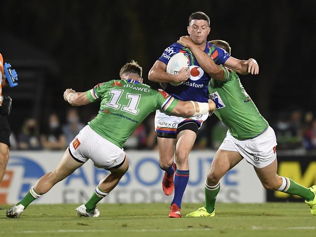 Chad Townsend of the Warriors is tackled during the round 24 NRL match between the New Zealand Warriors and the Canberra Raiders at BB Print Stadium in Mackay. Picture: Ian Hitchcock/Getty Images