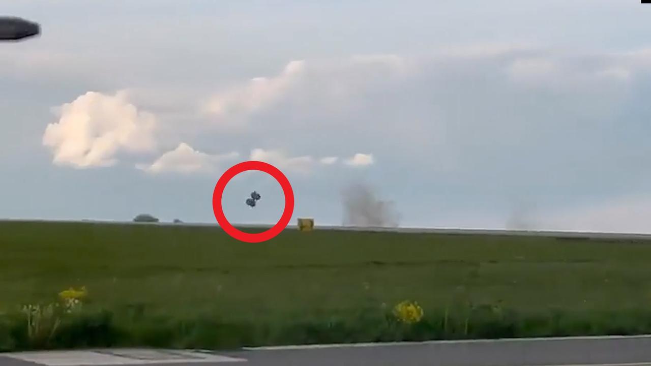 The heavy landing caused one of its wheel bogeys to detach and bounce into the air. Picture: Viralpress/Australscope