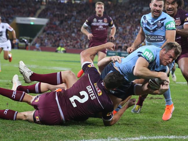 BRISBANE, AUSTRALIA - JUNE 05: Josh Morris of the Blues scores a try during game one of the 2019 State of Origin series between the Queensland Maroons and the New South Wales Blues at Suncorp Stadium on June 05, 2019 in Brisbane, Australia. (Photo by Chris Hyde/Getty Images)