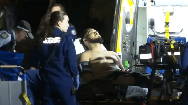 Vailena Koloamatangi being treated by paramedics after being shot in October. He has been targeted three times in the last four years, miraculously escaping death. Picture: Channel 7