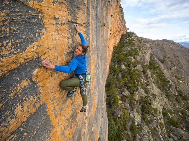 10/05/2019: Rock climber Kerrin Gale scales the mighty 'Taipan Wall' on the "Dance of Life" climb in the Grampians, which is currently a permitted climb whereas other parts of the area have been banned from climbing due to environmental concerns.  PIC: Simon Carter for The Australian