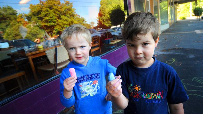 Patrick and Charlie were not happy when their chalk was taken away.