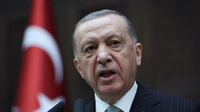 Turkish President Recep Tayyip Erdogan attends his party's group meeting at the Turkish Grand National Assembly in Ankara.