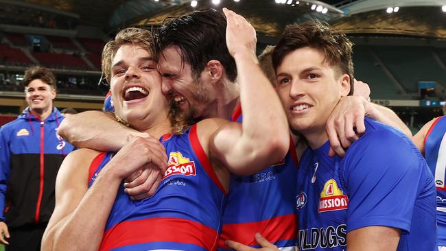 Easton Wood (centre) with young superstar Bailey Smith after the preliminary final. Picture: Michael Klein