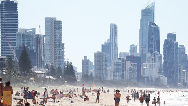 People on the beach at Broadbeach on the Gold Coast. Photograph: Jason O'Brien.