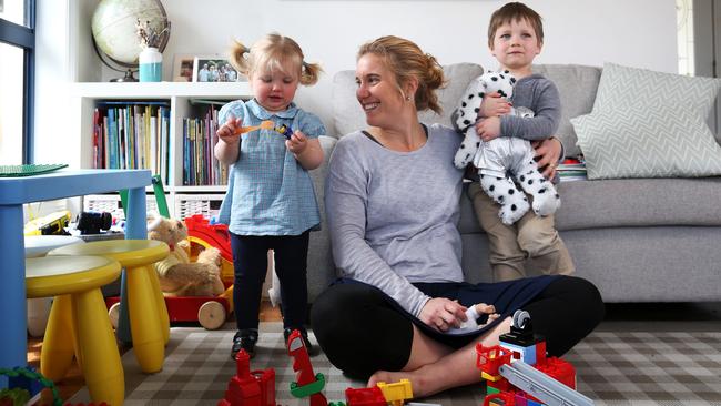 Kingborough GP Emily Isham with children Eleanor, left, 18 months, and Ned, 4, has helped those in the third world through medicine. Picture: NIKKI DAVIS-JONES.