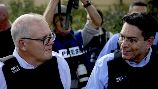 Former prime minister Scott Morrison with Israel's former envoy to the UN, Danny Danon, in Kfar Aza in Israel. Picture: Yoni Bashan