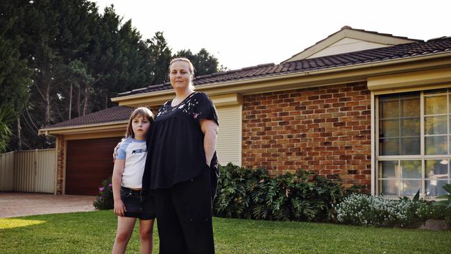 Gai Maher and daughter Bridie pictured at their Emu Plains home today, worried about house insurance hikes due to recent floods. Picture: Sam Ruttyn