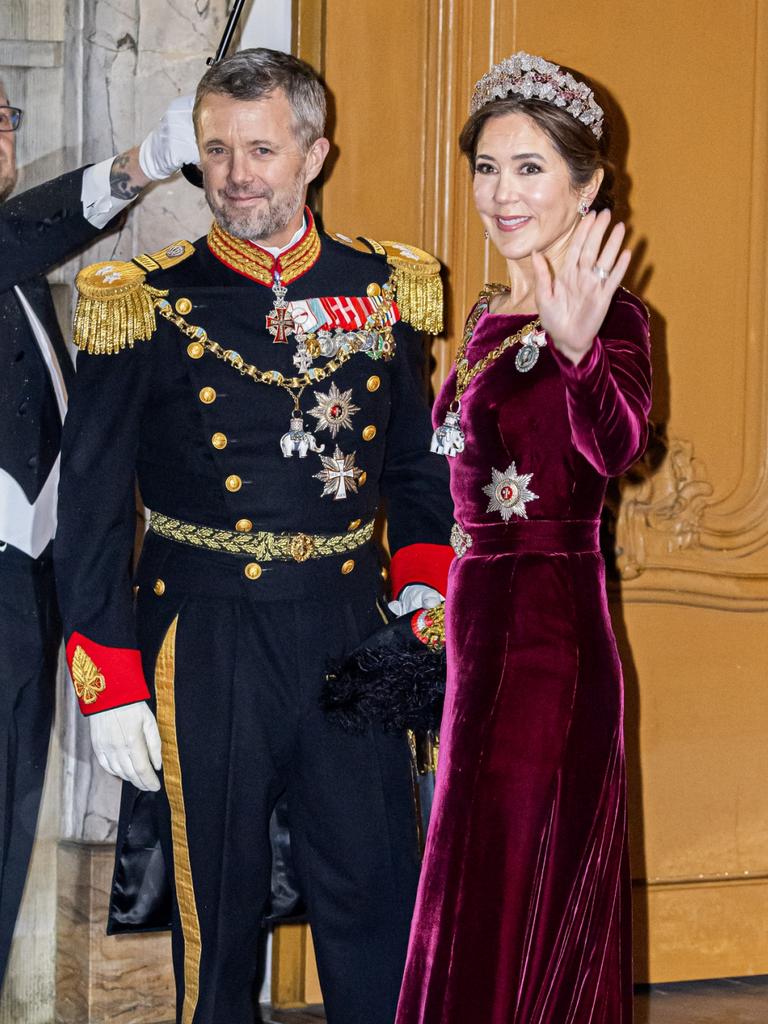 NOW: Mary donned the same dress - with a remodeled neckline and different accessories - 17 years later as she and Frederik celebrated New Year’s this year. Picture: Getty Images