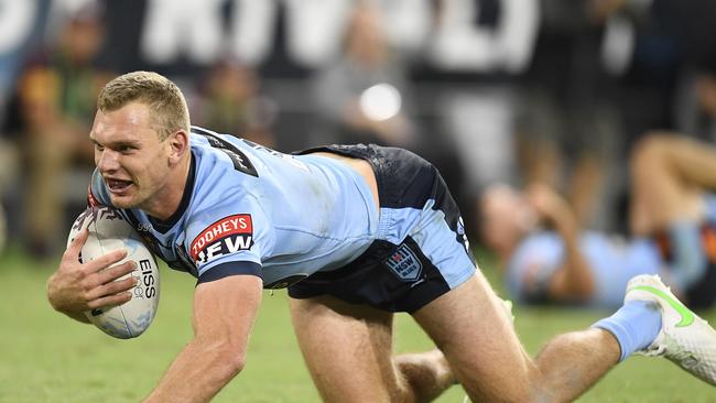 TOWNSVILLE, AUSTRALIA – JUNE 09: Tom Trbojevic of the Blues scores a try during game one of the 2021 State of Origin series between the New South Wales Blues and the Queensland Maroons at Queensland Country Bank Stadium on June 09, 2021 in Townsville, Australia. (Photo by Ian Hitchcock/Getty Images)