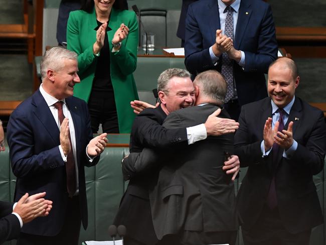 Shadow Minister for Infrastructure Anthony Albanese huged Mr Pyne after he delivered his valedictory speect. Picture: AAP/Sam Mooy