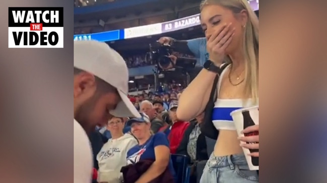 RED SOX FAN AWKWARDLY PROPOSES TO GIRL FRIEND