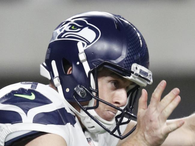 MINNEAPOLIS, MN - AUGUST 24: Michael Dickson #4 of the Seattle Seahawks punts the ball during a preseason game against the Minnesota Vikings at U.S. Bank Stadium on August 24, 2018 in Minneapolis, Minnesota. (Photo by Joe Robbins/Getty Images)