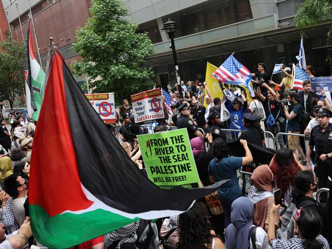 Pro-Israel protesters and Pro-Palestine protesters gather during a rally at Baruch College in New York City. Picture: Getty Images