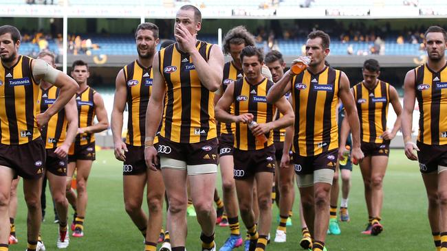 Hawthorn players leave the ground after Saturday’s loss. Picture: Michael Klein