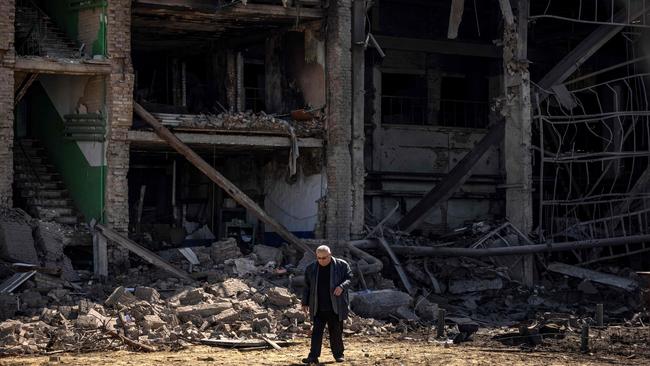 A man walks after the site was hit by overnight Russian strikes. Picture: FADEL SENNA / AFP