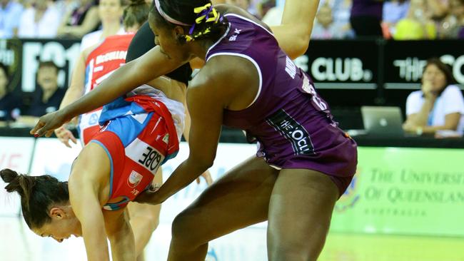 Sharni Layton up-ended by Romelda Aiken.