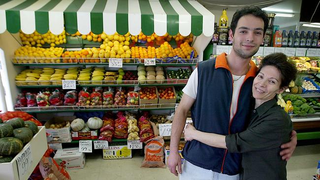 Michael Delios with his mother Voula Delios in the A and B foodstore in North Hobart back in 2003.