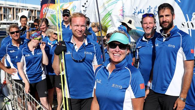 Wendy Tuck, with her Clipper round the world crew on Sanya Serenity Coast at the end of their Hobart race in 2018