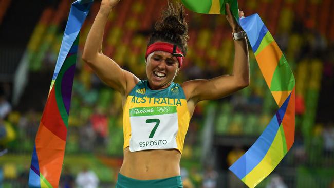 Australia's Chloe Esposito crosses the line to win the combined running/shooting portion of the women's modern pentathlon event at the Deodoro Stadium during the 2016 Olympic Games in Rio de Janeiro. Picture: AFP