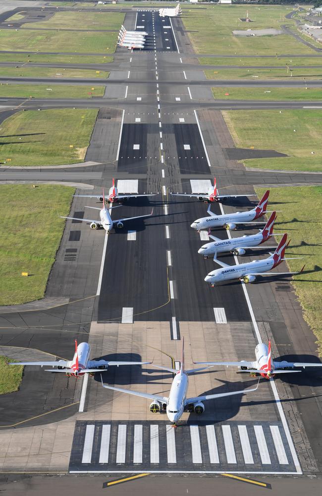 Planes parked on the runway at Sydney Airport on May 20, 2020 – this runway was shut to make space to store aircraft grounded due to the pandemic. Picture: James D. Morgan/Getty Images