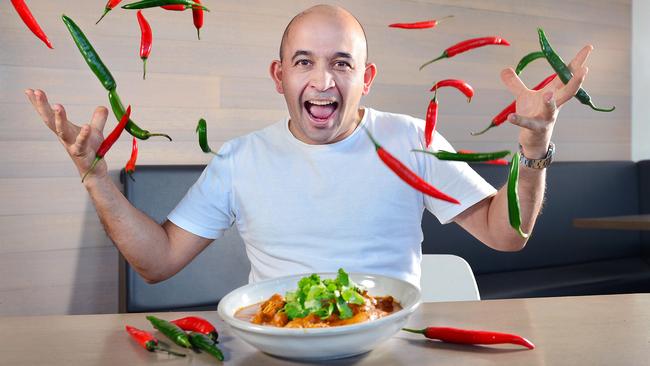 Tonka chef Adam D'Sylva with a bowl of his butter chicken and chillies. Picture : Nicki Connolly