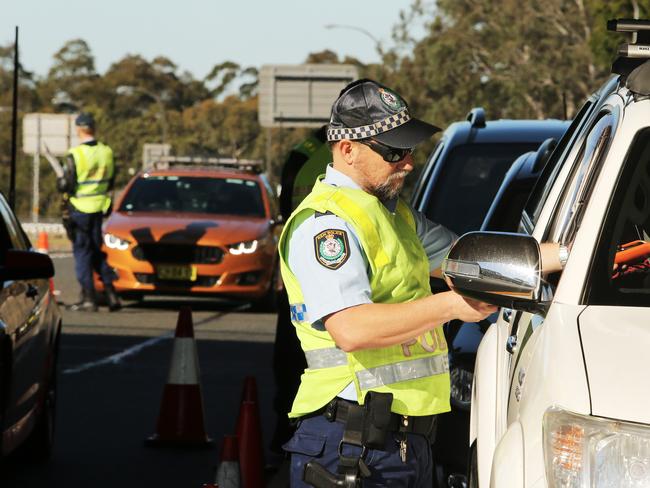 Embargoed for The Saturday Telegraph.RBT on Burns Bay Road near Hunters Hill.Senior Constable MurphyRandom breath testing started in 1982. Since then, trauma from fatal crashes involving alcohol has dropped from about 40 per cent of all fatalities to the 2017 level of 15 per cent. Police conduct about 5 million breath tests each year in NSW. Every police car is a mobile RBT.