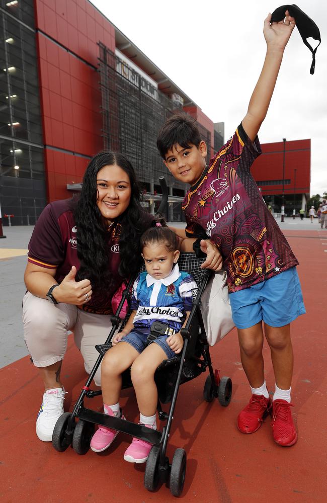 Leilani Holt, Eli-Ray Holt, 2, and Keanu Holt, 8, pictured at the Broncos v Rabbitohs, round 1, on Caxton Street, Brisbane 11th of March 2022. This is the first game for the BroncosÃ• season.