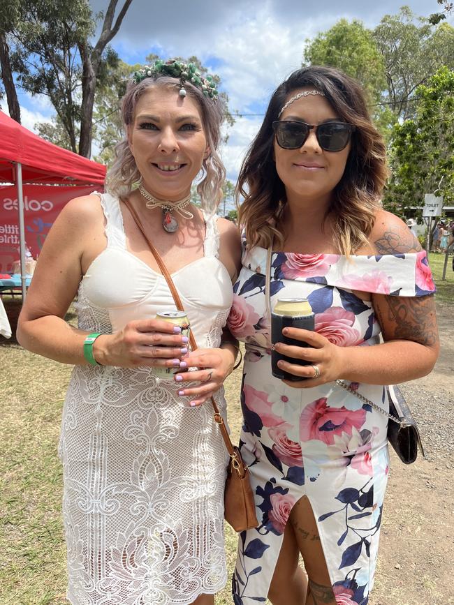 The girls having a blast at the Torbanlea Picnic Races.