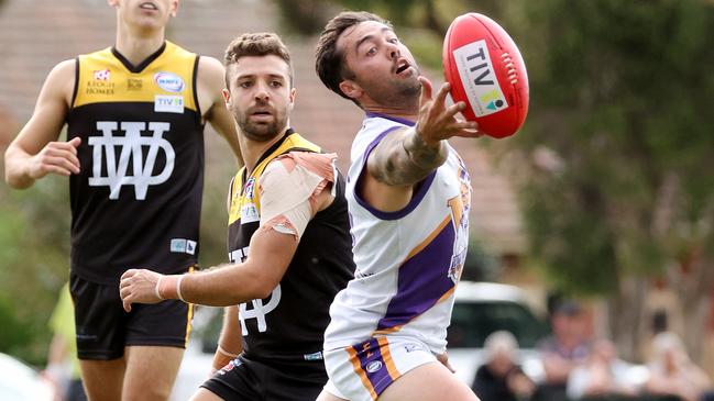 WRFL: Joshua Bench of Altona tries to bring the ball under control. Picture: George Sal