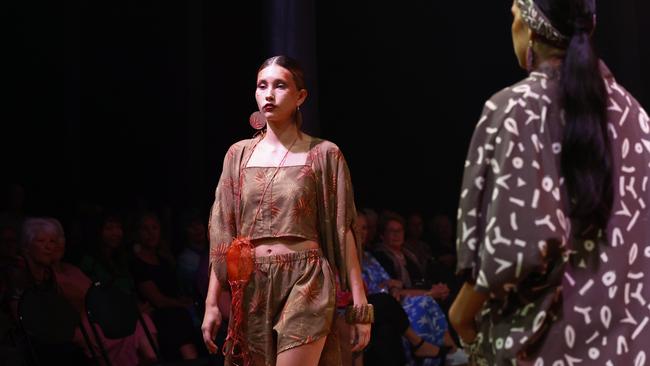 Nardia Blackhall showcases the Jedindi Bijarril collection by designer Jedess Hudson at the Cairns Indigenous Art Fair fashion performance, Woven, held at the Tanks Arts Centre, Edge Hill. Picture: Brendan Radke