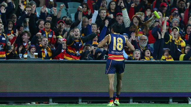 Adelaide’s Eddie Betts kicks a goal from his pocket and turns to his fans. Picture: Sarah Reed