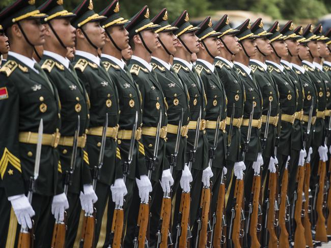 Chinese paramilitary guards prepare prior to the welcome ceremony for Luxembourg's Prime Minister Xavier Bettel and Chinese Premier Li Keqiang at the Great Hall of the People in Beijing on June 12, 2017. Bettel is on a four-day visit to China. / AFP PHOTO / FRED DUFOUR