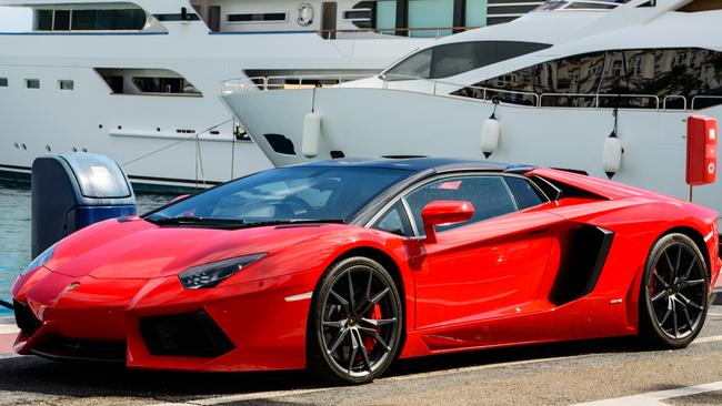 Luxury cars such as Lamborghinis are being used in the finance racket.