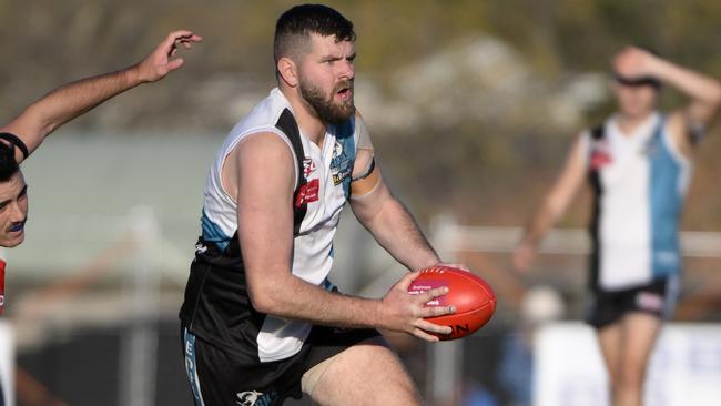 Jayden Murdoch on the run for Hillside. Picture: Andrew Batsch